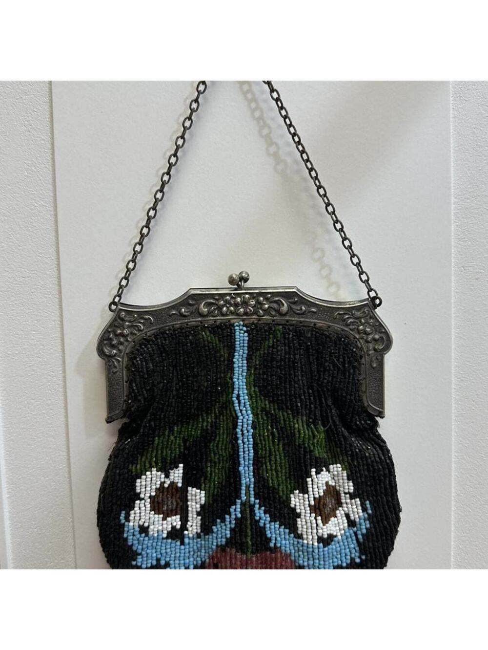 Vintage art deco fully beaded bag.  It does have missing beads/ loose threads. .